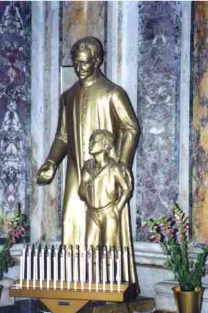 San Leonardo Murialdo con un bambino - Statua in gesso